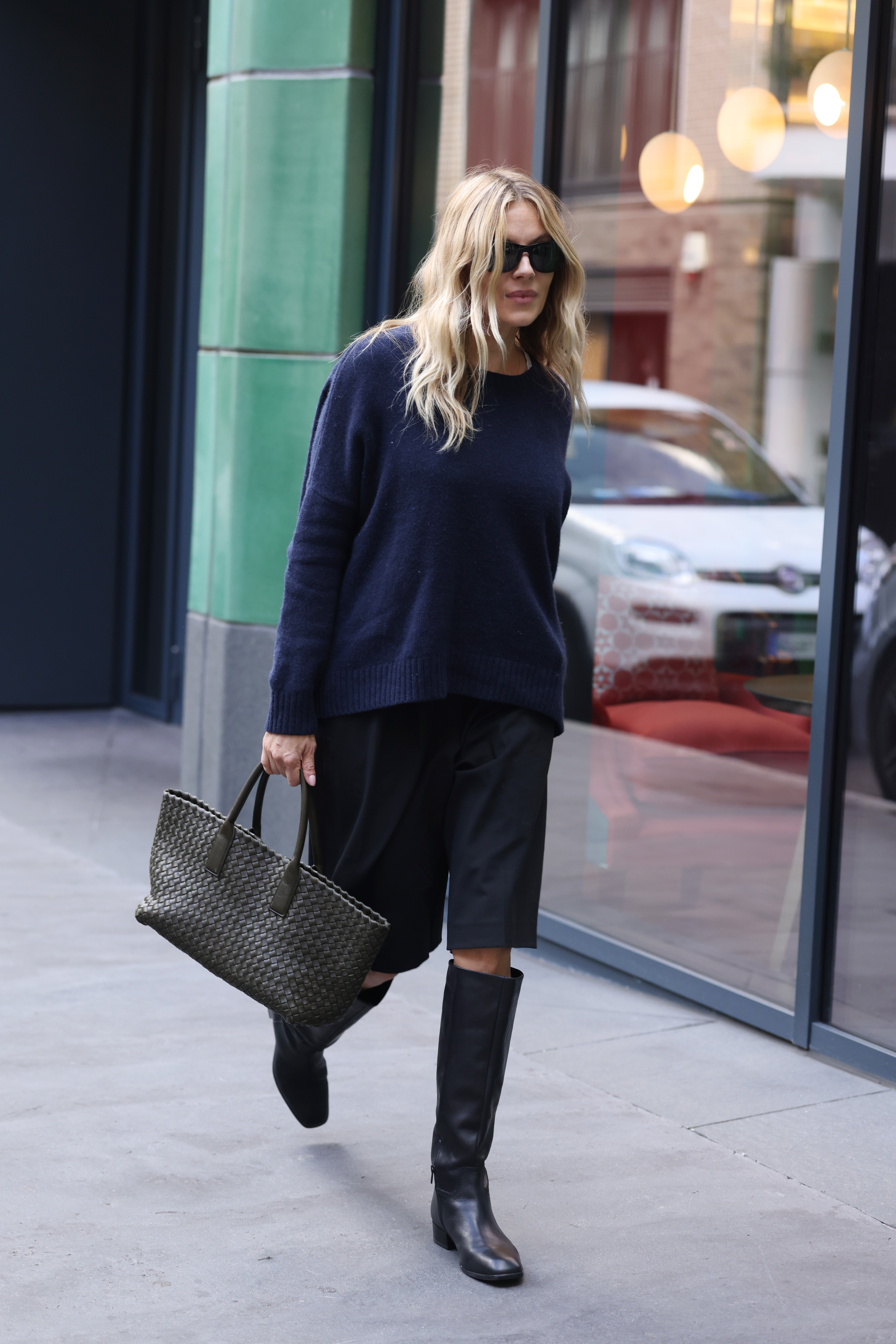 Sienna Miller seen wearing Dune London on October 16, 2026 in London, England.