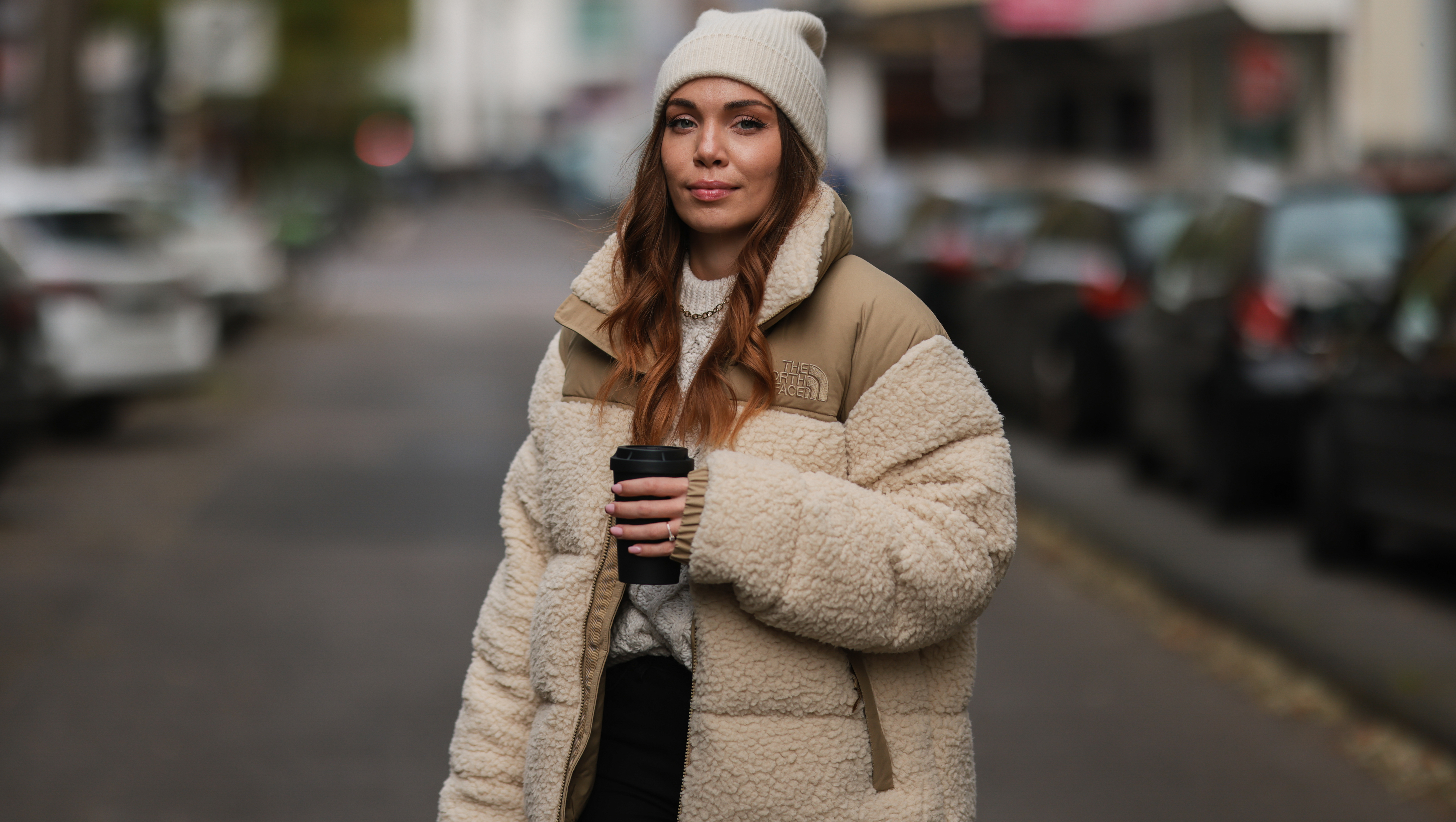 COLOGNE, GERMANY - OCTOBER 25: Anja Balovneva wearing The North Face puffer jacket, Weekday black pants on October 25, 2021 in Cologne, Germany. (Photo by Jeremy Moeller/Getty Images)